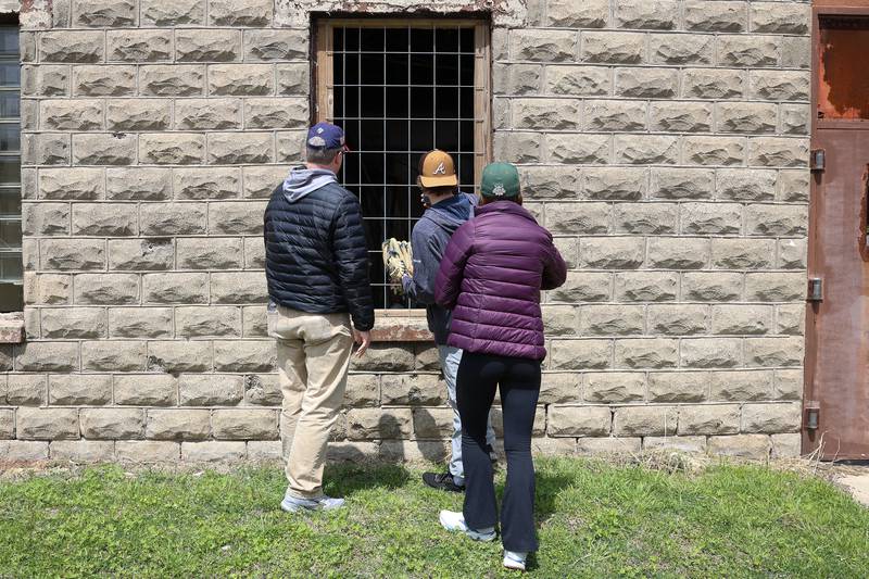 Several fans check out one of the prison building before the Joliet Slammers preseason game at the Old Joliet Prison on Thursday, April 29, 2026 in Joliet.
