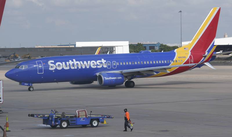 A Southwest Airlines plane moves to departs from Love Field in Dallas, Thursday, July 25, 2024. (AP Photo/LM Otero)
