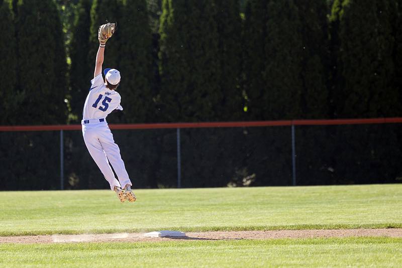 Newman’s Liam Nicklaus leaps for a throw against Stillman Valley Wednesday, May 22, 2024 in the Class 2A sectional semifinal in Byron.