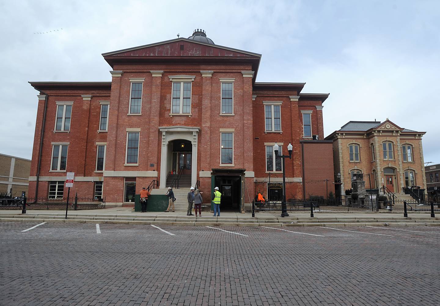 The Old Courthouse and Sheriff's House are pictured Tuesday, March 1, 2022, in Woodstock.  The renovation of the court building has started, with construction and demolition.