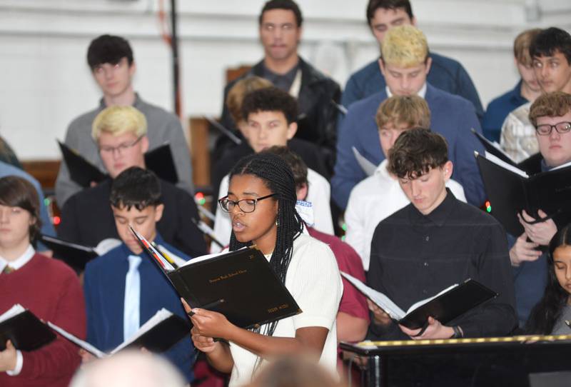 Alease McLain (center) sings a solo piece at the Oregon Music Department's Christmas Concert on Sunday, Dec. 15, 2024 at Oregon High School.