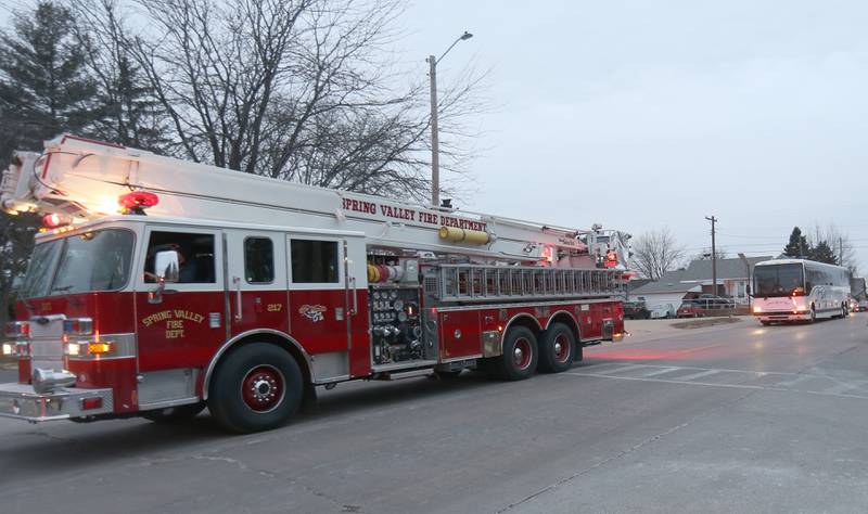 A Spring Valley fire engine escorts members of the JFK seventh-grade girls basketball team on Thursday, Dec. 12, downtown Spring Valley. The Wildcats will face Mt. Sterling Brown County in the IESA Class 2A State Championship.