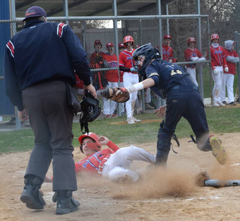 Polo catcher Jackson Willis tags out Morrison's Jacob Banks at home plate during a Thursday, April 10, 2025 game in Polo.