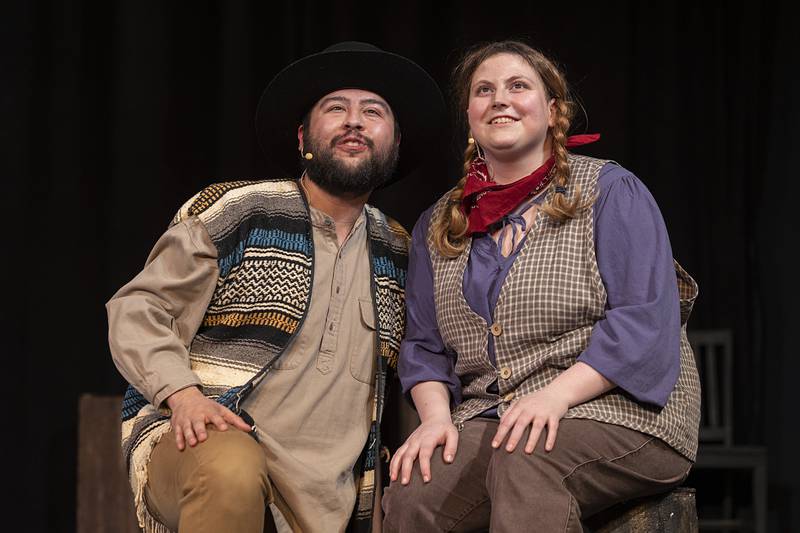 Brian Guin playing the part of Julio Valderez and Montana Larson playing Jennifer Rumson rehearse a scene for PAG’s “Paint Your Wagon,” Monday, April 13, 2026.