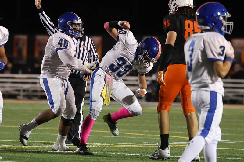 Joliet Central’s Paul Slick celebrates a defensive stop against Plainfield East on Oct. 4, 20234 in Plainfield.