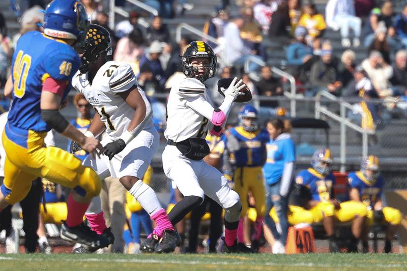 Joliet West’s Evan Gould looks to pass against Joliet Central on Saturday.
