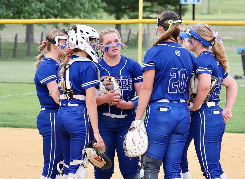 Princeton players huddle up in Saturday's regional championship. Morrison won 9-0.