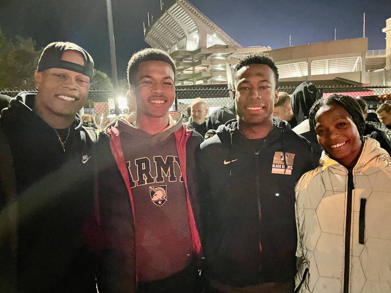 Justin Walters (from left) Damon Walters, Brandon Walters and Kayla Walters pose after one of Brandon's games at Army.