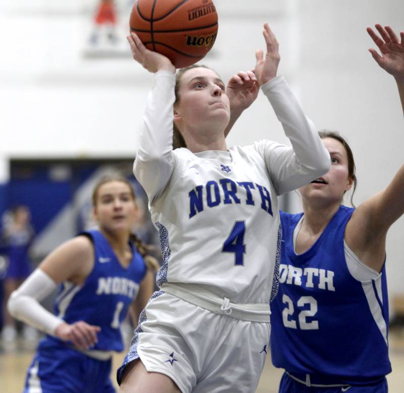 St. Charles North’s Julia Larson shoots the ball during the Class 4A St. Charles North Regional final against Wheaotn North on Thursday, Feb. 16, 2023.