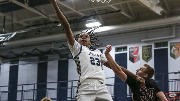 Photos: Oswego East vs. Plainfield North boys basketball