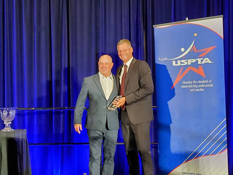 Tony Cherone (left) was recently honored by the United States Professional Tennis Association at National High School Coach of the Year.