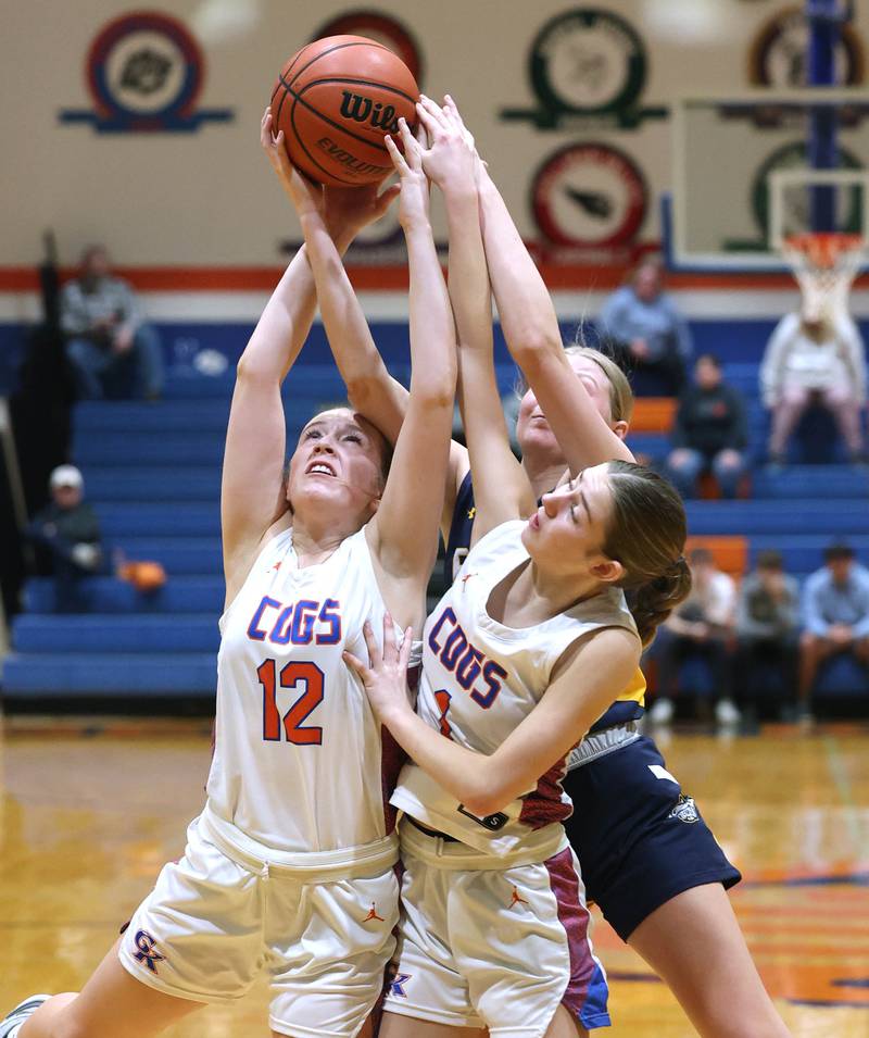 Genoa-Kingston's Ally Poegel, (left) and Presley Meyer and Polo's Syndei Rahn go after a rebound during their game Monday, Jan. 29, 2024, at Genoa-Kingston High School.