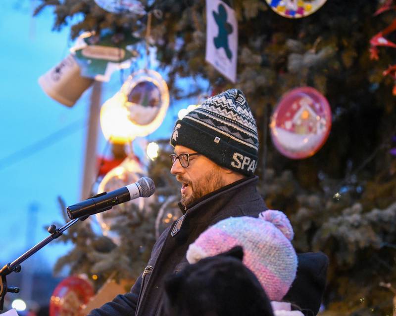 Downers Grove Mayor Pro Tem Greg Hose speaks during the Christmas tree lighting ceremony on Friday Nov. 29, 2024, held in downtown Downers Grove.