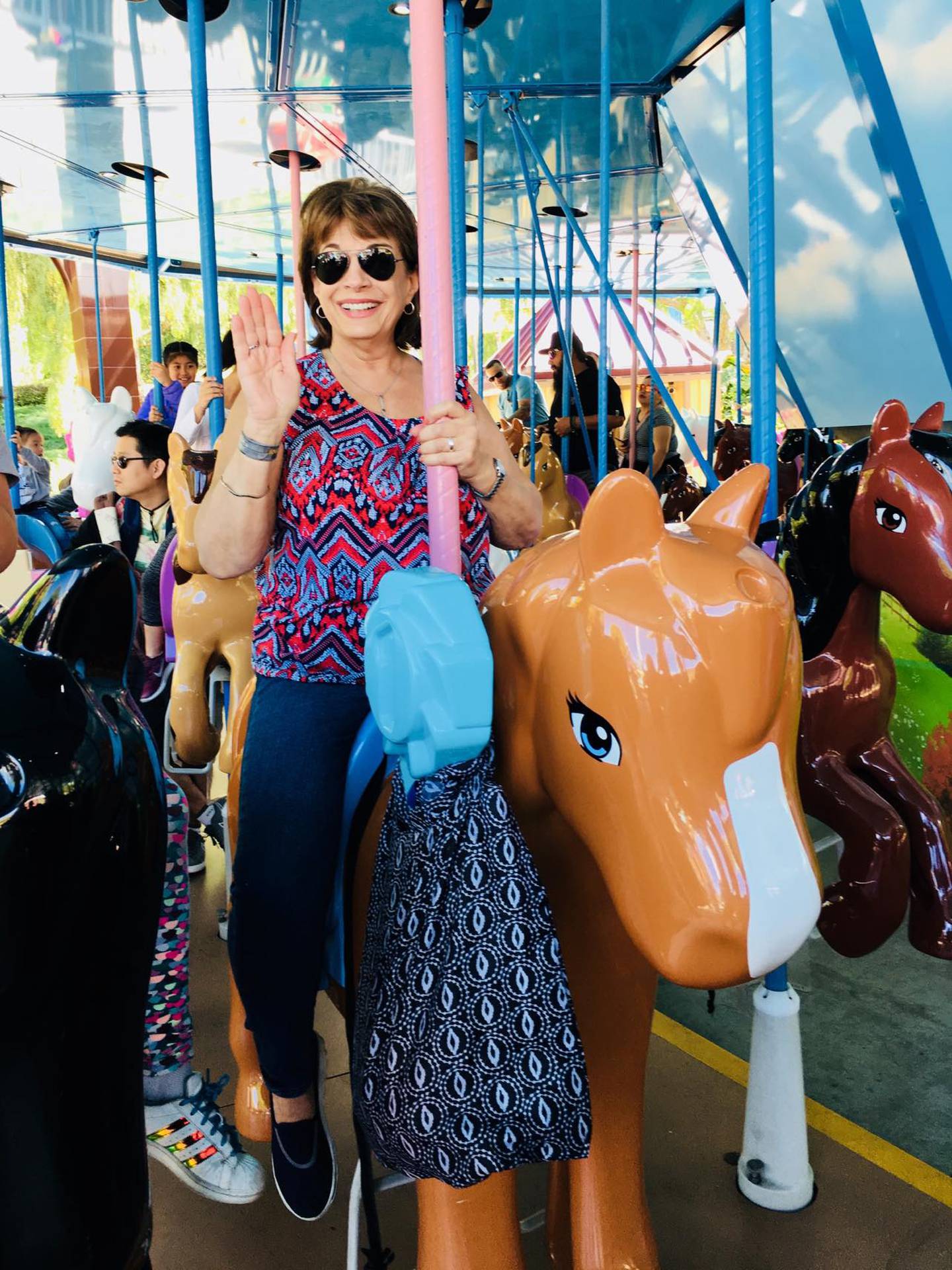 Carmel Perino of Homer Glen is seen enjoying a merry-go-around in 2018.