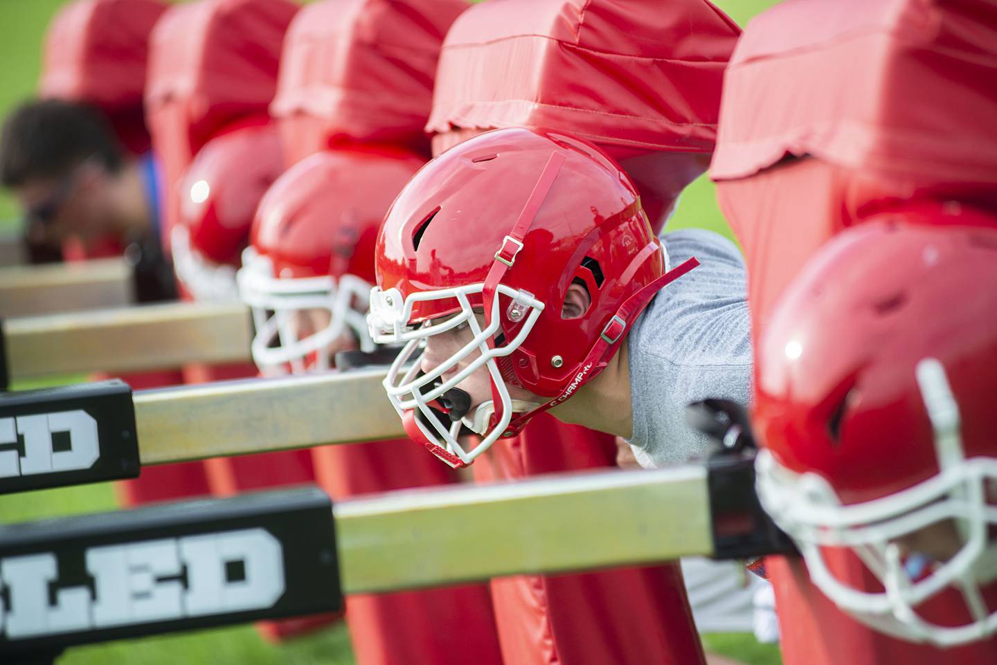 Morrison football players run through drills Tuesday, July 26, 2022.