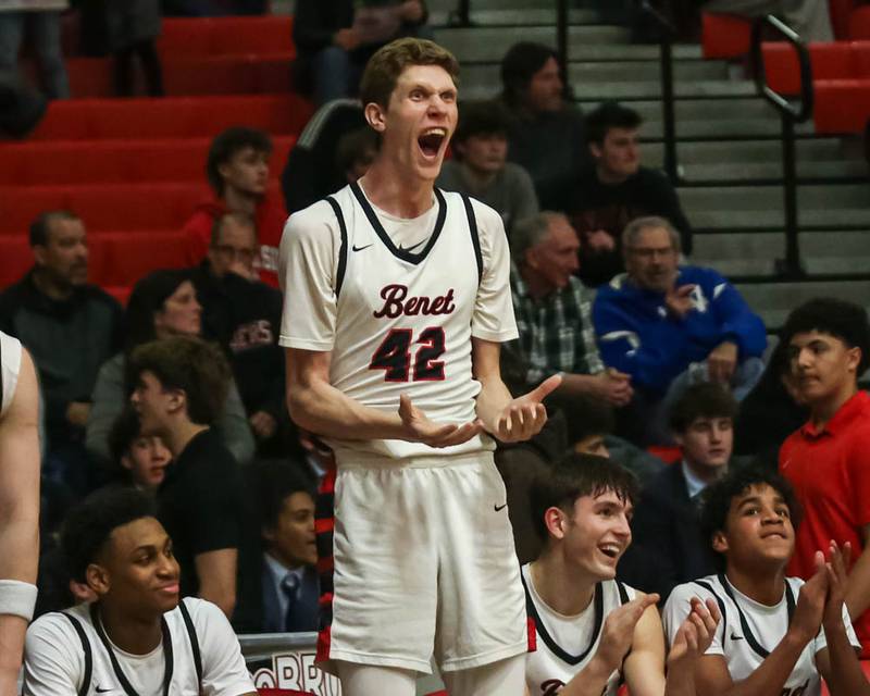 Benet's Colin Stack (42) cheers on the team late in the fourth quarter during their Class 4A Bolingbrook Sectional semifinal basketball game between Yorkville at Benet, March 3, 2026 in Bolingbrook.