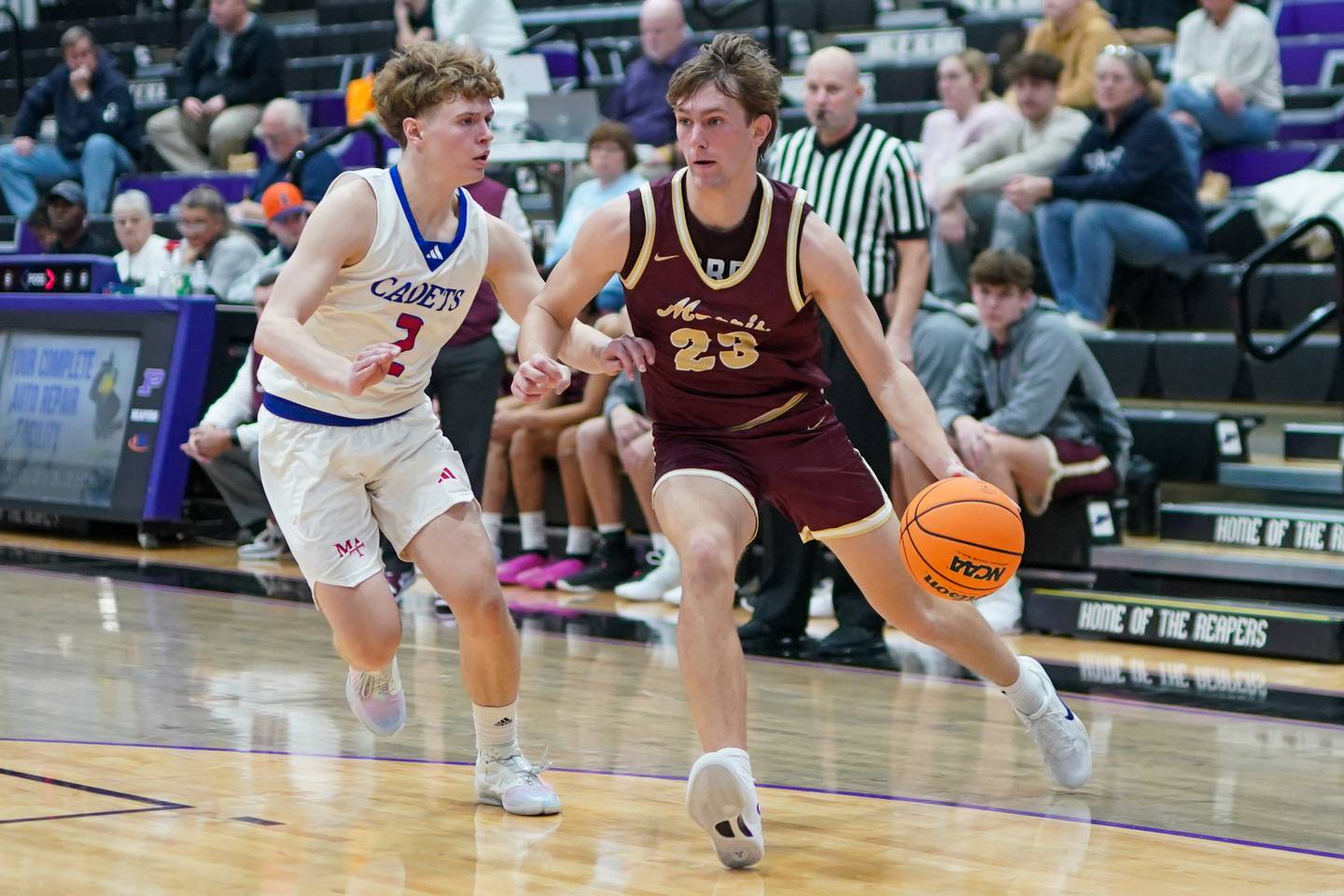 Morris’ Jack Wheeler (23) drives to the basket against Marmion's Caden Anderson (2) during a basketball game in the opening round of the 61st annual Plano Christmas Classic at Plano High School on Monday, December 23, 2024.