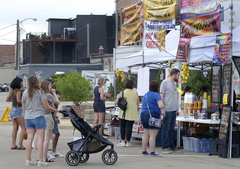 The annual Infinity Food & Art Festival featured many food trucks offering a variety of cuisine Saturday on the Jordan Block in Ottawa.
