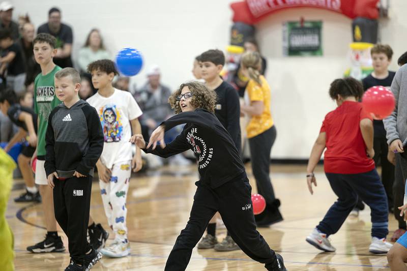 Kids fire on Grinch Saturday, Nov. 23, 2024, as part of the fun in Rock Falls. The annual Grinch dodgeball show down is a popular event as part of Rock Falls’ Hometown Holiday’s celebration.