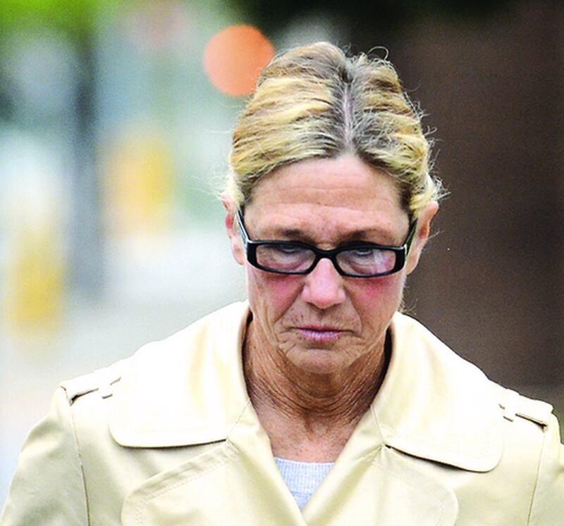 Former Dixon Comptroller Rita Crundwell arrives May 7 at the federal courthouse in 
Rockford.