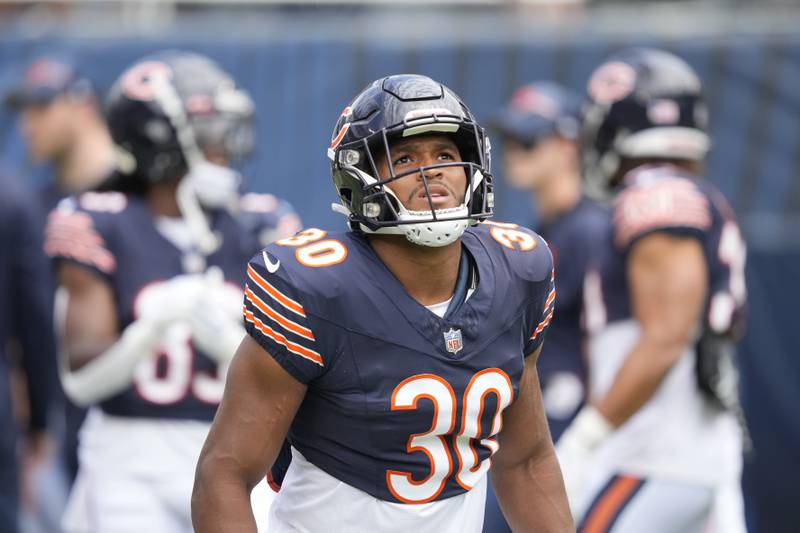 Chicago Bears running back Roschon Johnson warms up before a preseason game against the Tennessee Titans, Saturday, August 12, 2023, in Chicago.