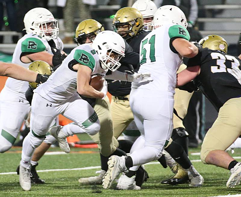 Providence Catholic's Kaden Nickel (5) runs the ball in for a touchdown against Sacred Heart-Griffin in the Class 4A state title on Friday, Nov. 25, 2022 at Memorial Stadium in Champaign.