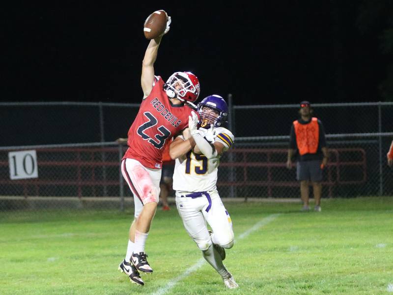 Hall's Jack Curran misses a catch as Sherrard's Jackson Jones defends on Friday, Sept. 19, 2025 at Richard Nesti Stadium.