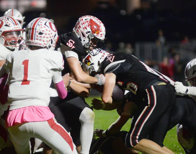 Stillman Valley's Ethan Waugh (46) fights for yards against Oregon on Friday, Oct. 10, 2025.