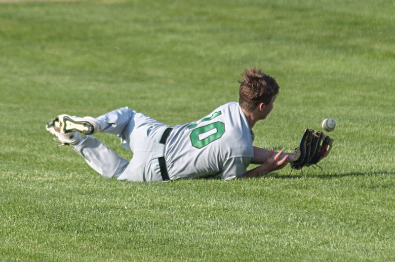 North Boone’s Jack Lipinsky is unable to hold onto a diving catch Thursday, May 12, 2022 off the bat of Dixon’s Mitchell White.