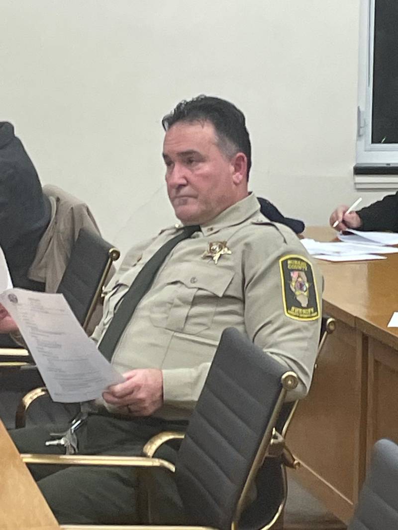 Bureau County Sheriff Jim Reed listens Tuesday, Jan. 14, 2025, during a meeting of the Bureau County Board. The board, partly at Reed’s urging, tabled an intergovernmental agreement with Cook County for overflow inmates to be housed in Bureau County Jail. Though Reed said there was “misinformation” about the agreement, he recommended the board study it in more detail.