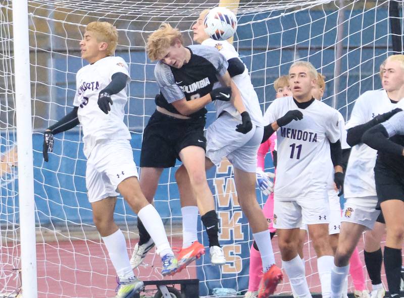 Mendota's Abel Nanez (center) blocks the ball during the Class 1A State title game on Saturday, Nov. 8, 2025 at Hoffman Estates High School.