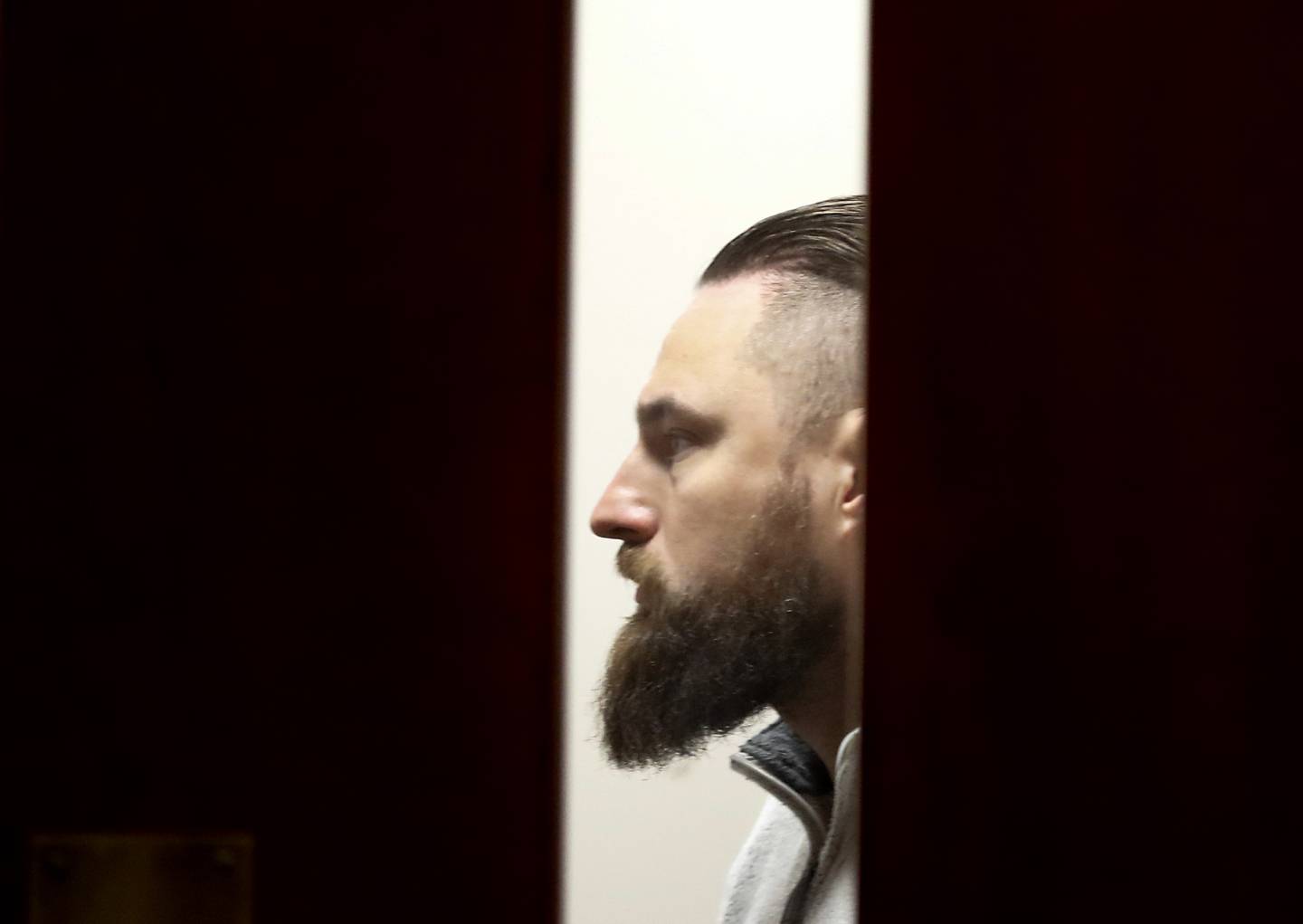 Matthew Lilla talks with his attorney before a court hearing Wednesday, April 12, 2023, in the McHenry County courthouse. Lilla, 36, of Chicago, is charged with drug trafficking and other felonies.
