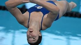 Oswego East’s Katie Malm first did diving as a freshman for fun. Now she’s a record-setting 2-time state champ