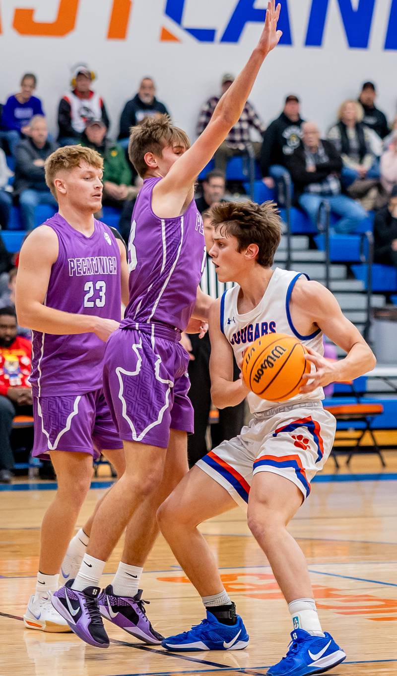 Eastland's Parker Krogman drives into the paint during the championship game of the Eastland Holiday Tournament on Thursday, Dec. 19, 2024.