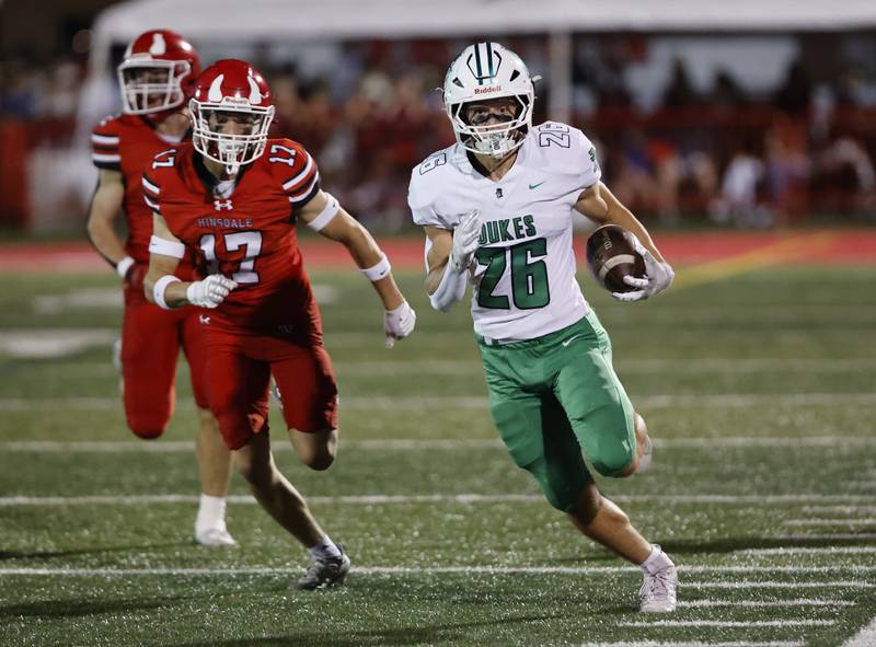 York's Henry Duda (26) runs the ball during the varsity football game between York and Hinsdale Central on Friday, Oct. 3, 2025 in Hinsdale, IL.