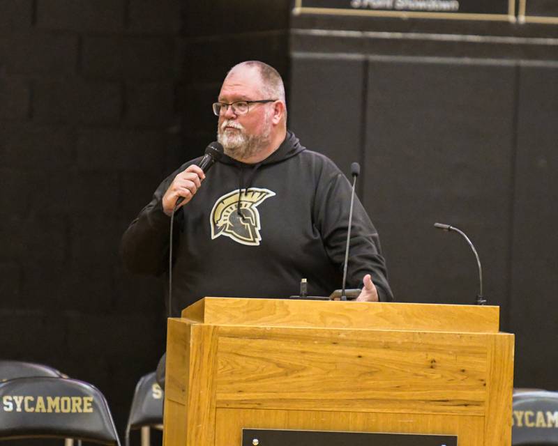 Sycamore High School Athletic director Chauncey Carrick welcome community members to the pep rally held at the high school on Wednesday June 4, 2025, after the boy’s track team won the 2A championship.