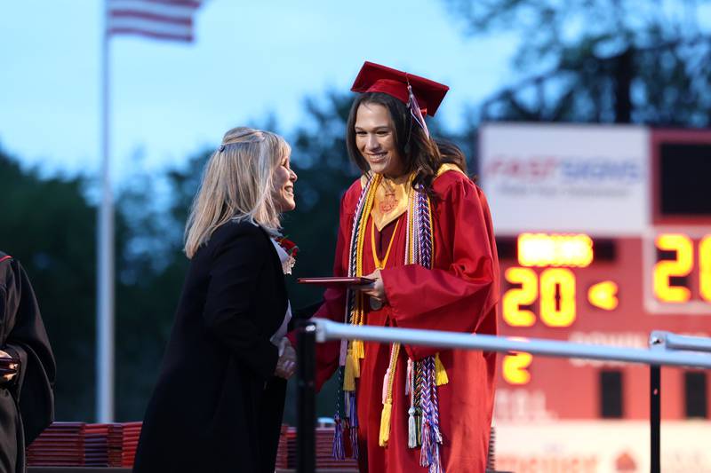Graduate Alexis McCullough receives her diploma during the Bradley-Bourbonnais Community High School commencement ceremony on Thursday, May 21, 2026.
