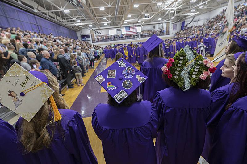 Senior choir members wait to take the stage Sunday, May 26, 2024 during commencement at Dixon High School.