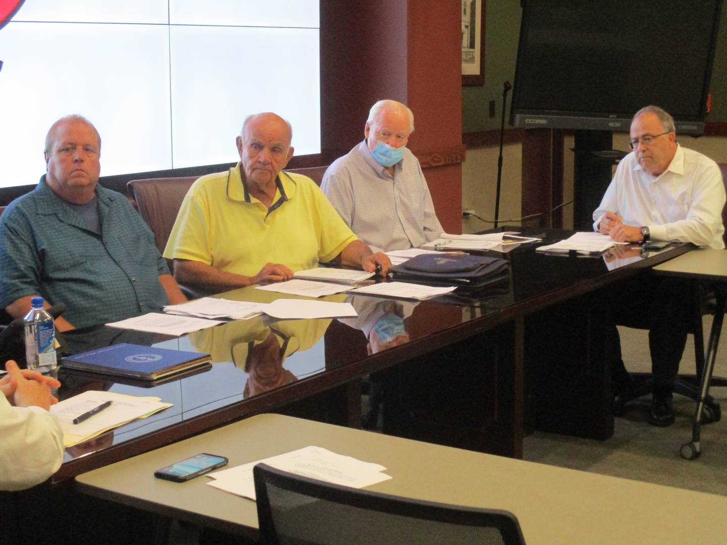 Trustees of the Oswego Fire Protection District Board discuss plans for a third attempt at a tax increase referendum. They are, from left, Rodger Long, President Richard Kuhn, Robert Tripp and Ken Holmstrom. (Mark Foster -- mfoster@shawmedia.com)