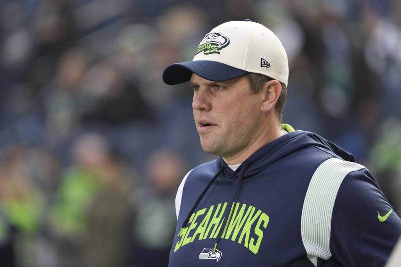 Seattle Seahawks offensive coordinator Shane Waldron watches warm ups prior to an NFL football game against the New York Jets, Sunday, Jan. 1, 2023, in Seattle.