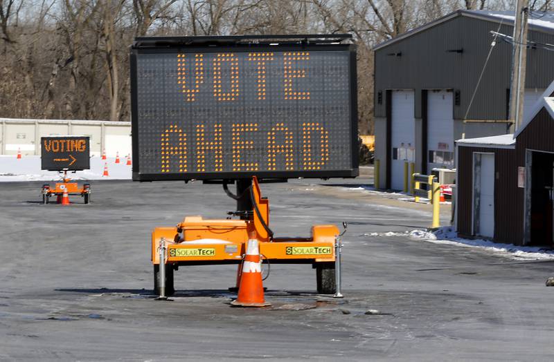 Signs directing voters where to go vote on Thursday, Feb. 20, 2025, at the Algonquin Township Office at 3702 US Hwy 14, in Crystal Lake.