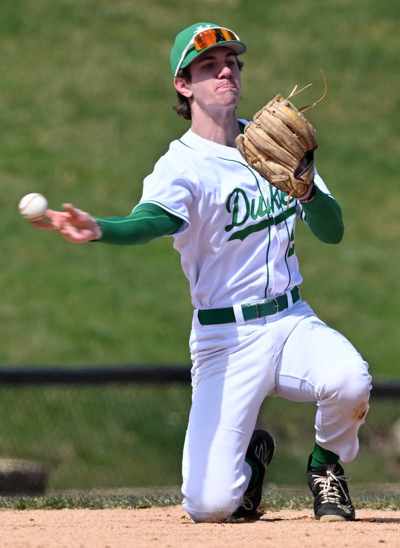York shortstop Josh Fleming throws from one knee to get the force at second against Maine South at Wintrust Field on Wednesday, March 27, 2024 in Schaumburg.