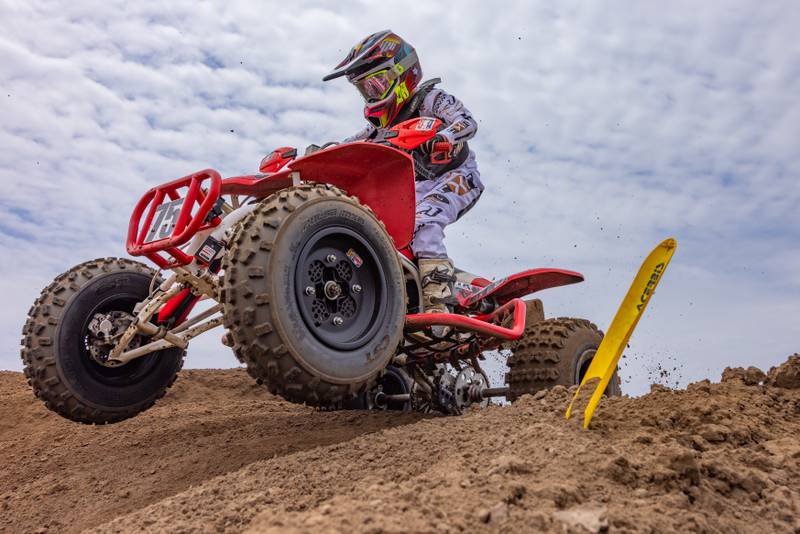 Racer Nate Joiner accelerates out of the tight corner as he lead the ages 6-11 group during the ATVMX Championship race on May 24, 2025 at Sunset Ridge MX in Walnut.