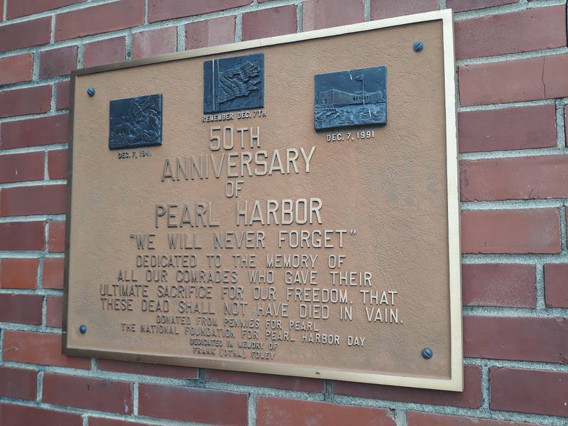 A plaque outside of the Ottawa VFW serves as a reminder of those who lost their lives during the attack on Pearl Harbor, Dec. 7, 1941.