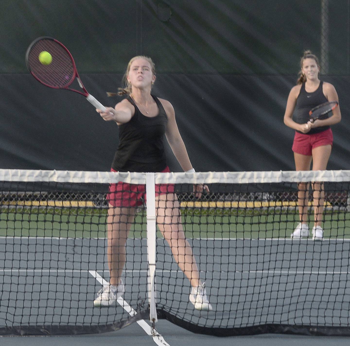 Ottawa’s Emma Cushing (left) and Rylee O'Fallon compete at No. 1 doubles Tuesday, Sept. 26, 2023, during the Pirates' home meet with La Salle-Peru.