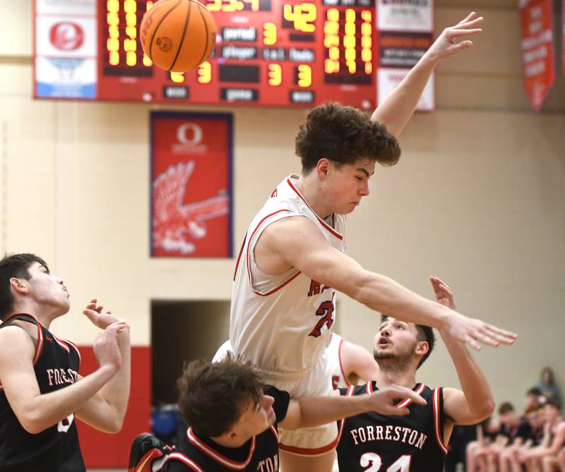 Oregon's Ethan Peeling draws contact as he jumps for a rebound against Forreston on Tuesday, Feb. 17, 2026 at the Blackhawk Center in Oregon.