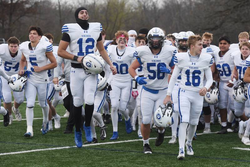 Geneva players celebrate their 49-14 victory over Lake Forest during the Class 6A football quarterfinal game on Saturday, Nov. 16, 2024 in Lake Forest.