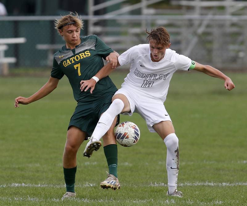 Crystal Lake South's Nicholas Prus battles with Huntley's Hudson Nielsen for control of the ball during a Fox Valley Conference soccer match on Thursday, Sept. 28, 2023, at Crystal Lake South High School.