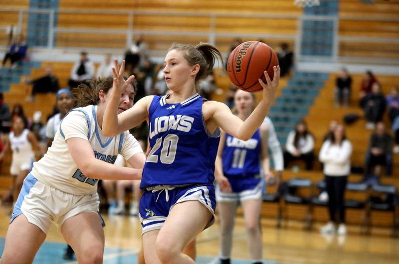 Lyons Township's Avery Mezan goes after the rebound during the West Suburban Conference championship game against Downers Grove South on Thursday, Feb. 13, 2025 at Willowbrook High School.