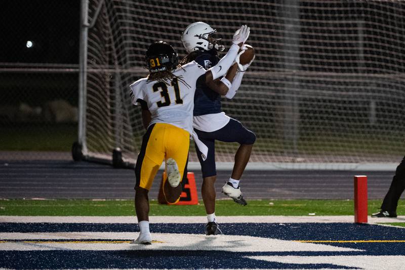 Plainfield South's Buddy Amos catches a pass, scoring a touchdown during a game against Joliet West,  Friday Oct. 4, 2024 at Plainfield South High School